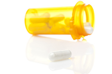 A yellow pill bottle