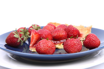 Strawberry Tart portion decorated with strawberry fruits
