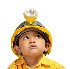 Cute and adorable young asian boy acting as an Engineer