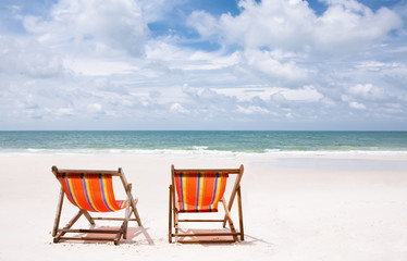 chairs on a coastline
