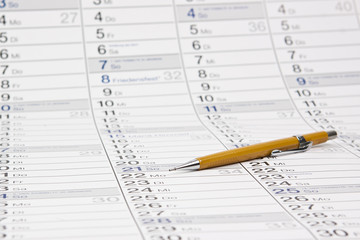 Kalender mit Stift  