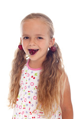 Little girl with cherry earrings