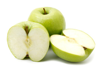 Green apple fruits and two halves of apple