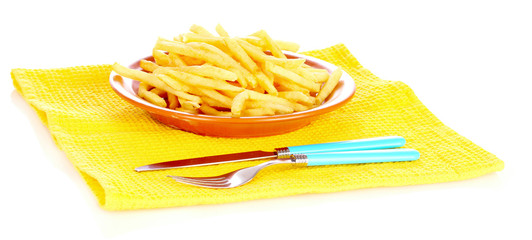French fries on a plate and cutlery isolated on white