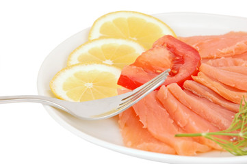 Fresh salmon steak with lemon slice and dill