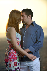 Naklejka premium happy young couple have fun on beach