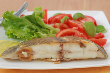 fried flounder with salad