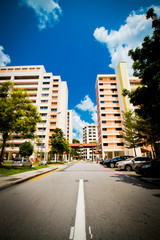 Fototapeta na wymiar High rise flats against a blue sky
