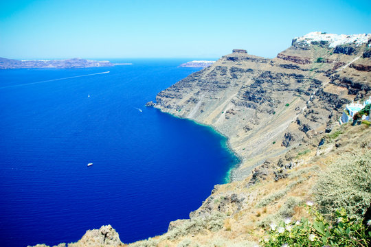 the rocky coastline of santorini island