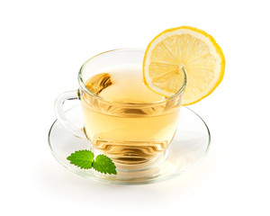 tea in cup with leaf mint and lemon