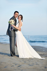 Fototapeta na wymiar romantic beach wedding at sunset