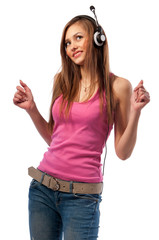 Obraz na płótnie Canvas girl in jeans and headphones