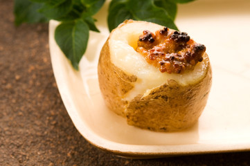 Baked potato with sour cream, grain Dijon mustard and herbs