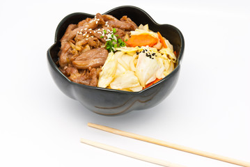 rice under fried pork and vegetable