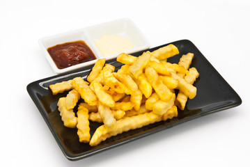 French fries in black plate