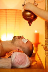 Man having an oil massage