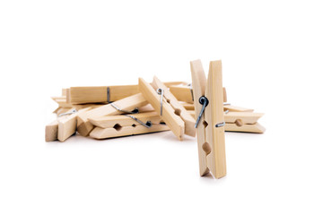Wooden clothespin prepared, isolated on a white background.