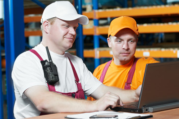 manual workers in warehouse