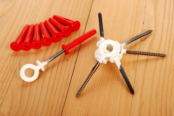 TASSELLI CON VITI AD OCCHIELLO