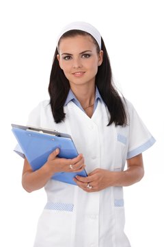 Pretty nurse with papers