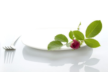 Place setting with rose