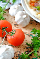 Pizza, tomatoes and garlic