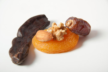 Nuts carob dried apricots almond spice fruit date