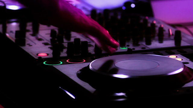 Dj scratching at cd player