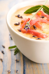 fresh melon soup with parma ham and lavender flower
