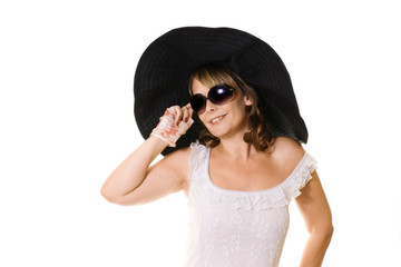 Attractive woman wearing black hat and sunglasses