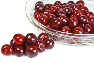 cherries on a glass dish