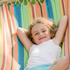 Summer vacation - girl in colorful hamock