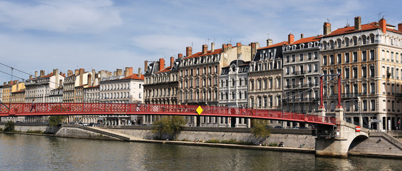 Lyon city with red footbridge in summer
