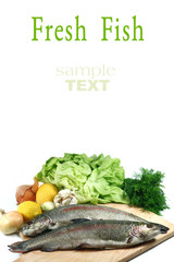 Fresh fish close up with vegetables