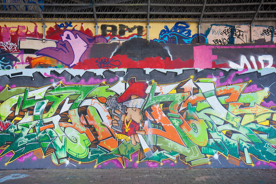 Graffity art at a gangway under a viaduct