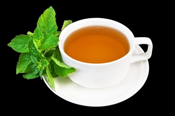 Herbal tea with mint in a white cup