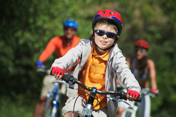 Boy riding bicycle