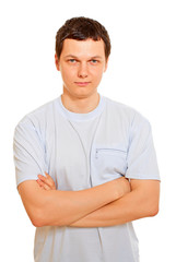 Obraz premium Serious young man over white background