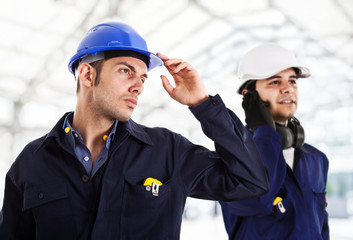 Two engineers working in a construction site
