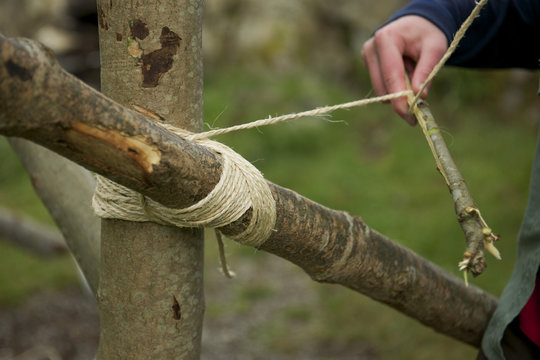 Scouts tying a knot