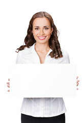Fototapeta premium Smiling businesswoman showing blank signboard, isolated
