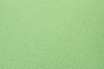 light pastel green background with round organic ornaments