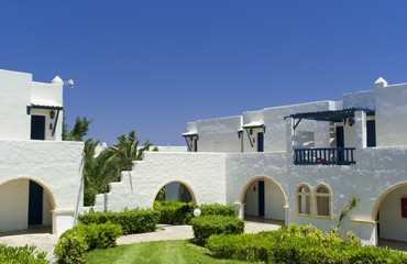 Fototapeta na wymiar Greek mediterranean bungalow architecture. Cyclades