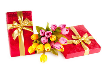 Celebration concept - gift box and tulip flowers