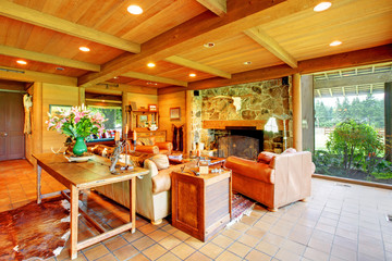 Large living room on the horse ranch with the kitchen.