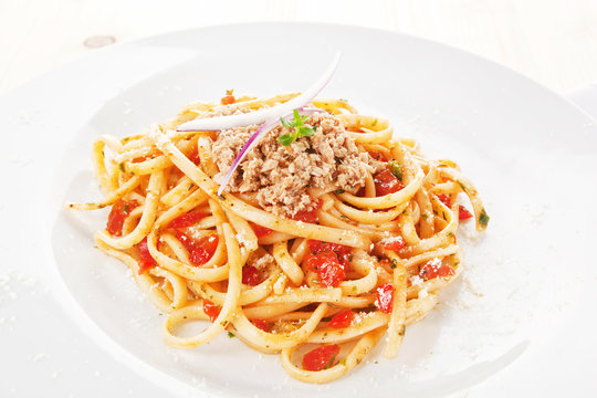 Tasty spaghetti with tomato sauce and tuna.