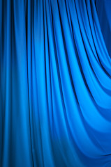 Fototapeta premium Brightly lit curtains for your background