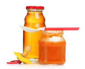 baby food and spoon isolated on white