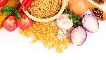 Pasta spaghetti with tomatoes, olive oil and basil on a white ba