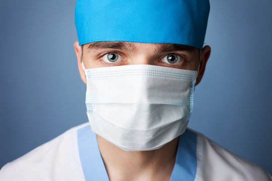 close up portrait of medical doctor in mask